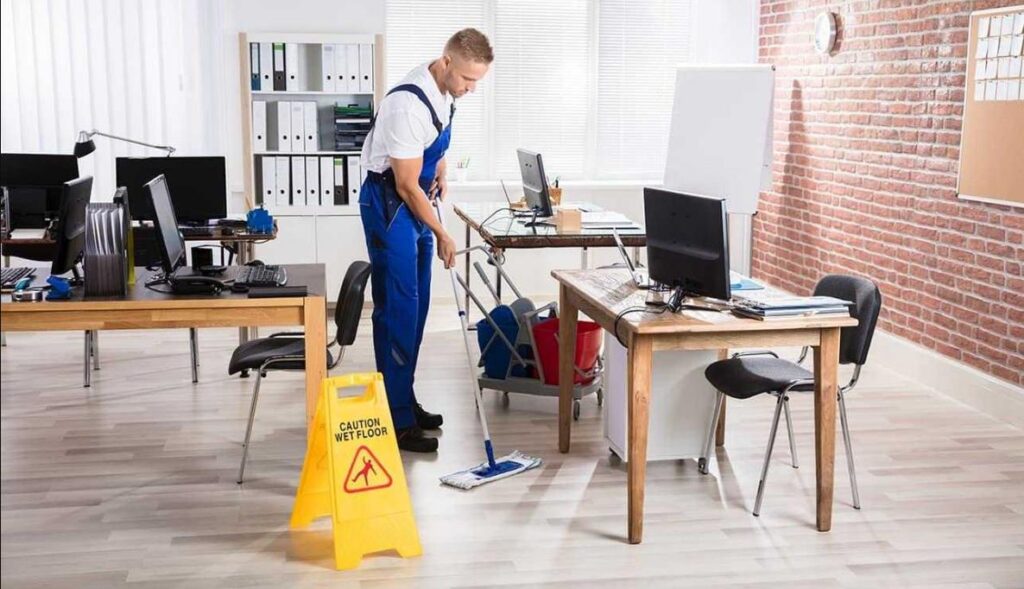 Clean and organized office space with employees working efficiently in a bright, tidy environment